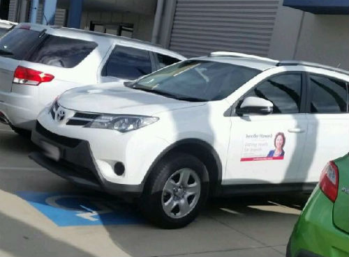 Article image for QLD MP for Ipswich advertising in disabled parking spot