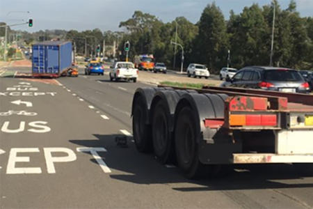 Truck loses rear axles at high speed