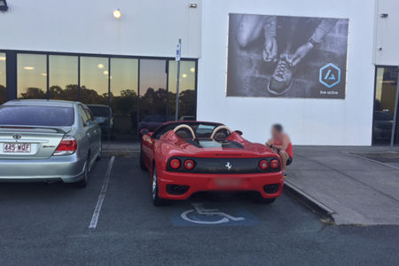 Ferrari parked in disabled parking spot at Sunshine Coast gym