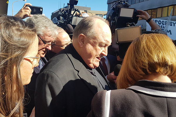 Article image for Archbishop gets home detention for protecting paedophile priest