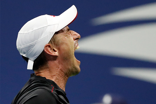 Article image for US Open upset: Australian John Millman defeats tennis great Roger Federer