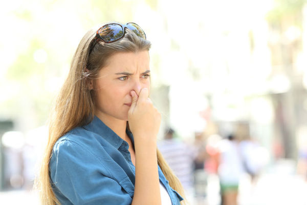 Residents threaten class action over bad smell