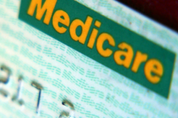 Boss of giant health insurer calls for Medicare to be axed