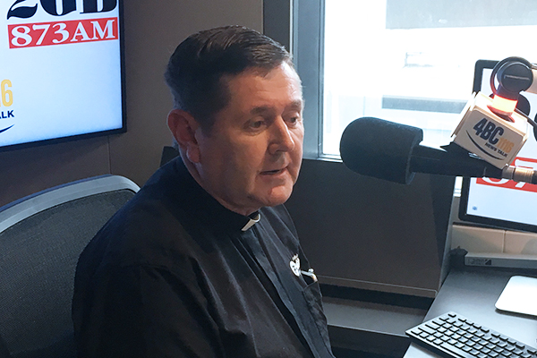 Father Chris Riley’s annual Christmas gift card drive