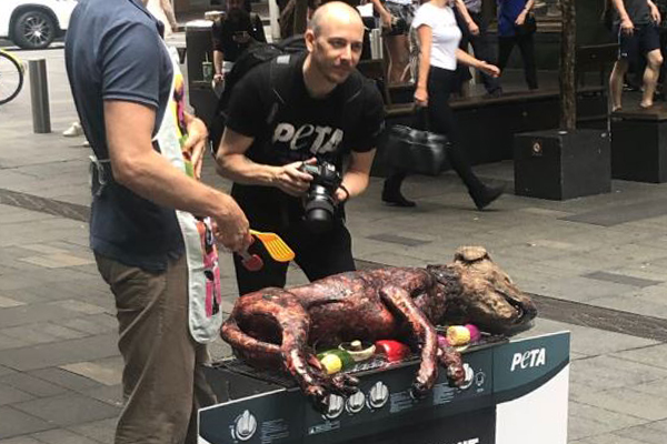 Article image for PETA stoops to new low, barbecues ‘dog’ in Sydney CBD