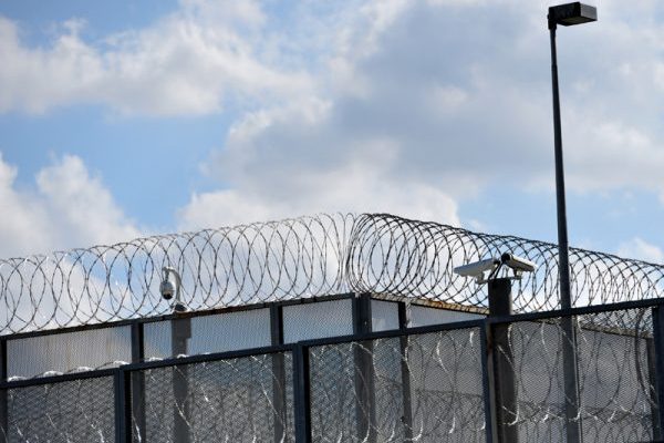 Article image for Female prison guard charged over Christmas party dust up