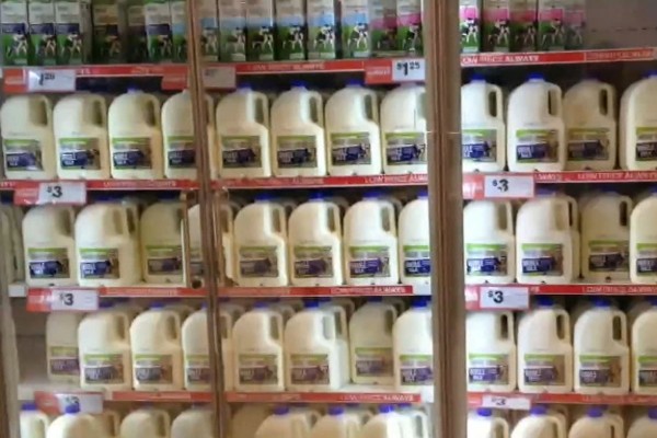 Coles and Aldi under fire over $1-a-litre milk