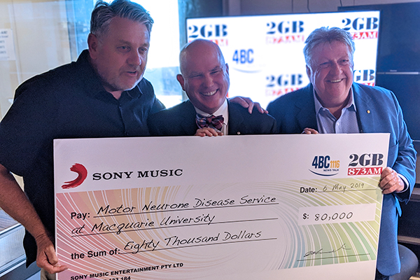 Article image for Ray Hadley presents another huge cheque for the fight against MND