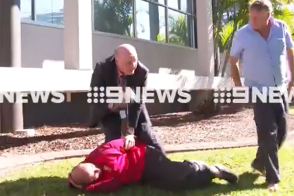 Article image for WATCH | Cop expertly tackles man who interrupted his press conference