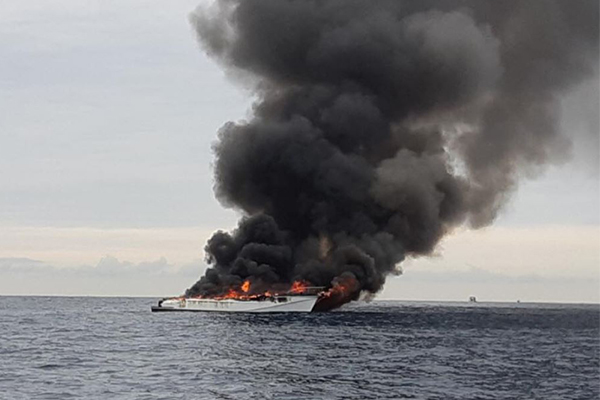 Article image for Eight people rescued after whale watching boat catches fire