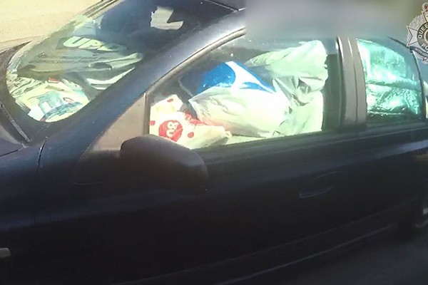Article image for WATCH | QLD man fined for driving car filled with garbage