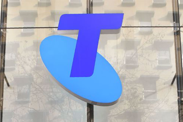 Telstra profits drop 40 per cent