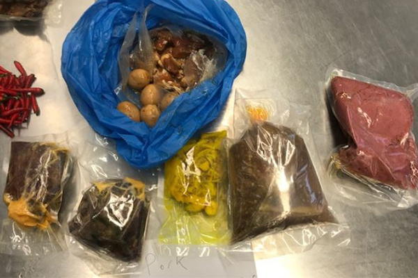 Article image for Woman deported for smuggling pork into Australia