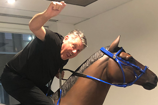 Ray Hadley caught horsing around in the office