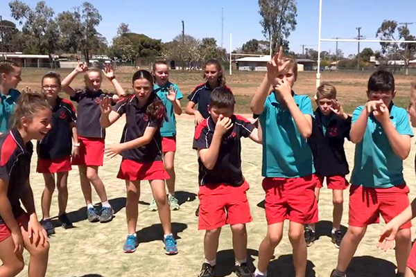 Article image for Young Aussies in drought-ravaged town call for nationwide rain dance