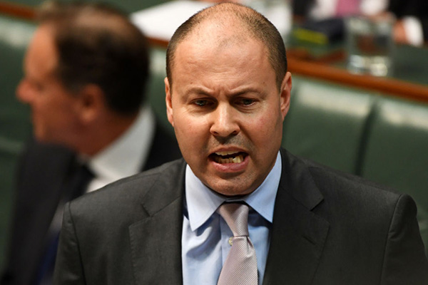 Article image for Josh Frydenberg promises to deliver surplus despite slashing forecast