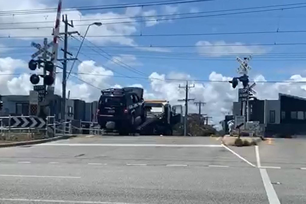 Article image for WATCH | Tow truck narrowly avoids being cleaned up by train