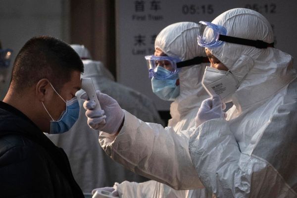 Article image for Fifth Australian infected with coronavirus, hundreds more trapped in China