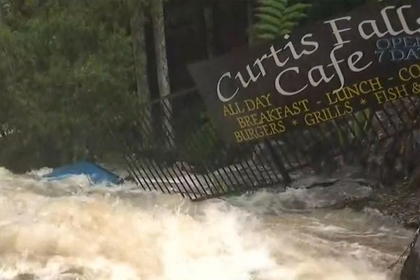 Article image for Streets turned into rivers as huge deluge falls on south-east Queensland