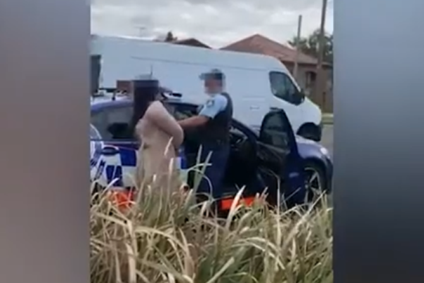 WATCH | Woman allegedly spits on a police officer