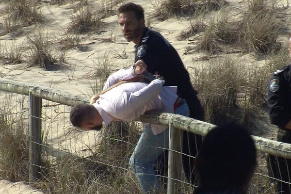 Article image for Sydney traveller busts through QLD border checkpoint, heads for the beach
