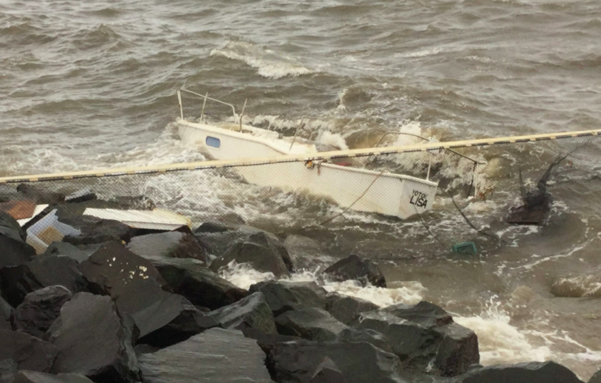 Article image for Mystery boat washes up on rocks in coastal town