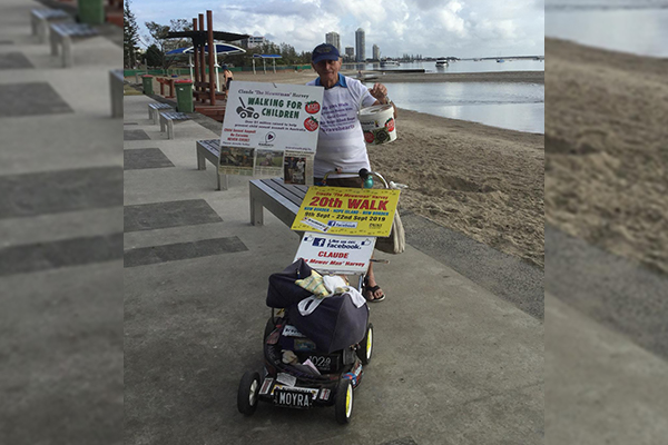 Article image for The man raising millions of dollars for charity by pushing his mower