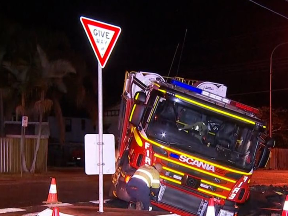 Article image for Sinkhole erupts in Greenslopes, drags firetruck down