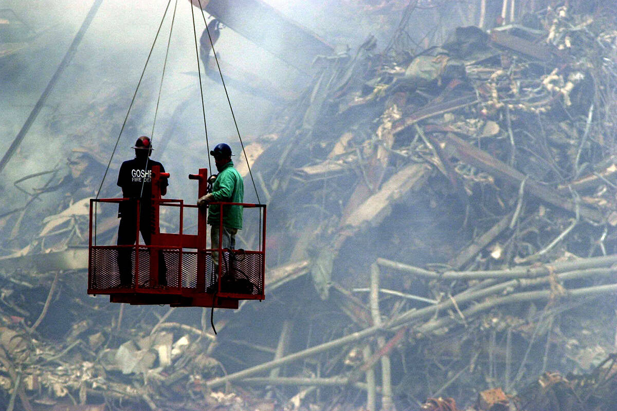 Article image for Photographer retells capturing harrowing scenes on the day the world changed