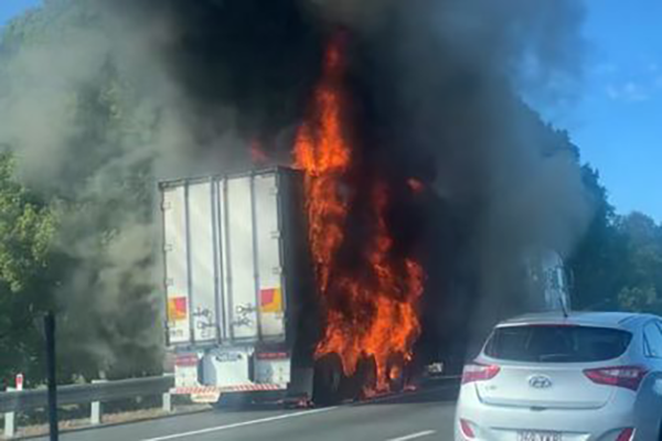 Article image for Traffic builds on M1 as truck engulfed in flames