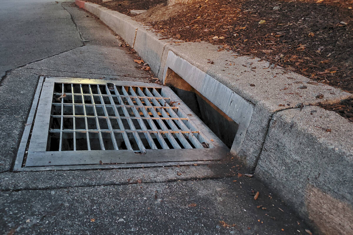 Article image for Man freed after four hours stuck in storm drain
