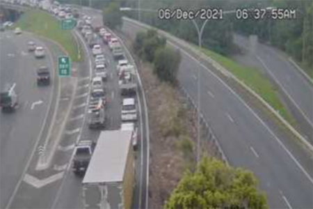 Two crashes wreak traffic havoc on Jindalee Bridge 