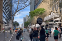 Climate protestors take to Brisbane CBD streets  