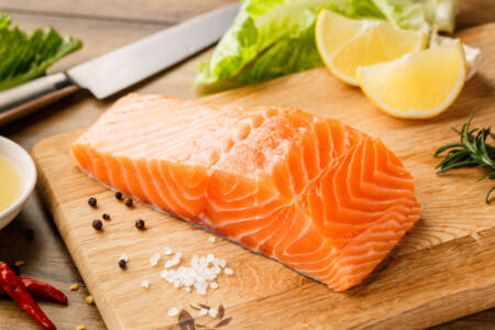 Grilled wild salmon with a side of couscous and orange miso dressing