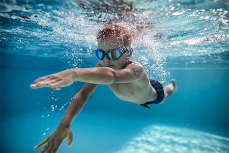 What is the recommended age to teach your child to swim?