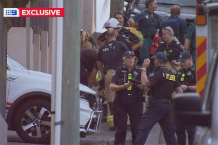 Sledgehammer-wielding man arrested after lengthy Brisbane siege