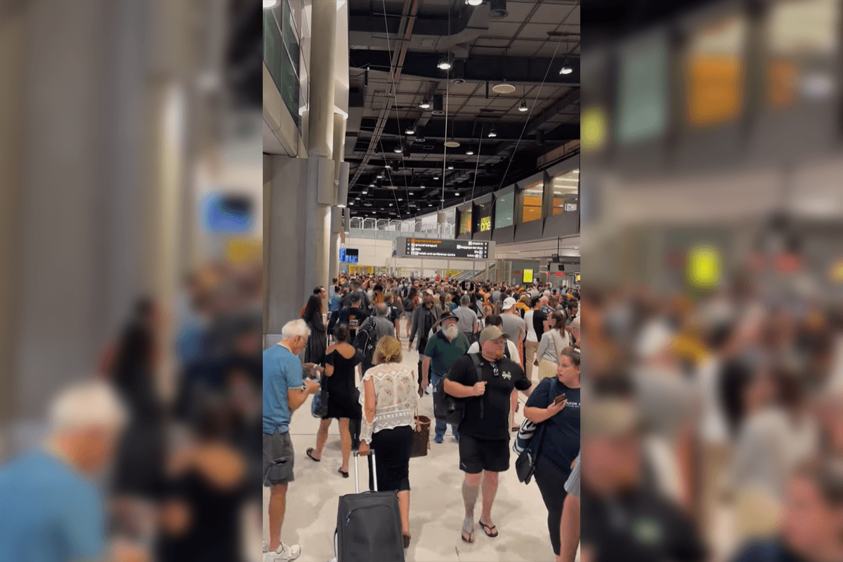 Article image for 33 flights delayed after security breach emptied domestic terminal