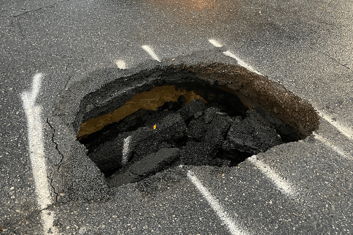 Article image for Coronation Drive reopens after sinkhole drama shut down road