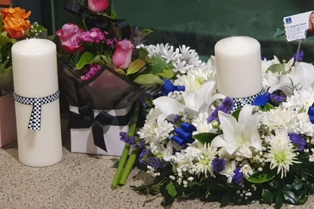 Article image for Brisbane honours slain police, neighbour in candlelight vigil