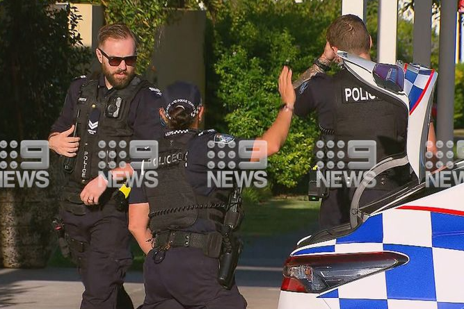 Article image for Teen boy charged with murder after man found dead on Brisbane road