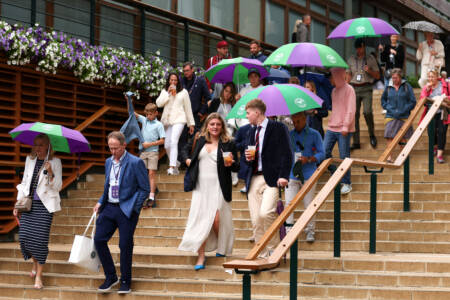 Wet weather at Wimbledon causing delays