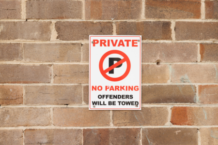 Small businesses challenge private parking ban